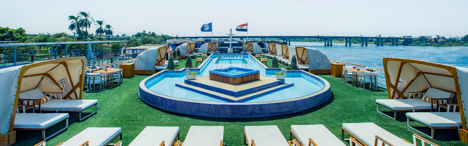 Sun deck and pool on a five-star Nile cruiser at dusk