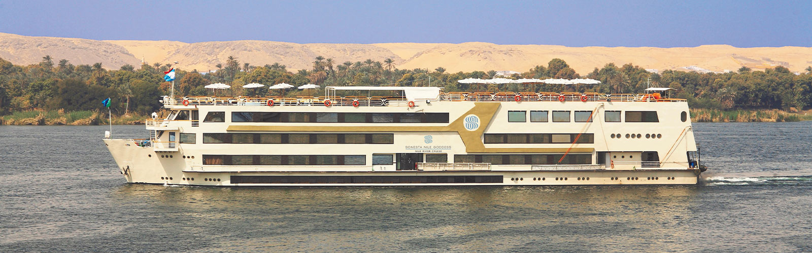Sonesta Nile Goddess cruise ship on the river at Aswan
